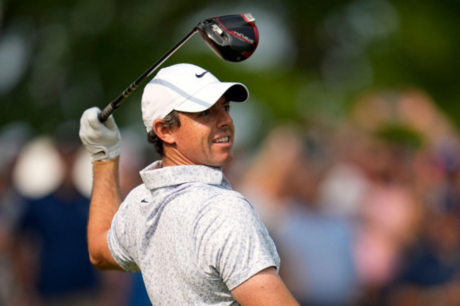 rory-mcilroy-of-northern-ireland-watches-his-tee-shot-on-the-14th-hole-during-the-final-round-of-the-pga-championship-golf-tournament-at-oak-hill-country-club-on-sunday-may-21-2023-in-pittsford