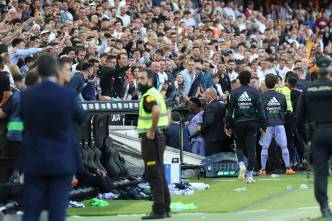 real-madrids-vinicius-junior-center-leaves-the-pitch-after-being-shown-a-red-card-during-a-spanish-la-liga-soccer-match-between-valencia-and-real-madrid-at-the-mestalla-stadium-in-valencia-spain