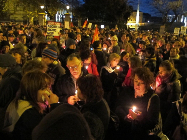abortion-rights-protesters-light-candles-in-memory-of-savita-halappanavar-during-a-protest-rally-outside-irelands-government-headquarters-in-dublin-saturday-nov-17-2012-thousands-marched-to-the