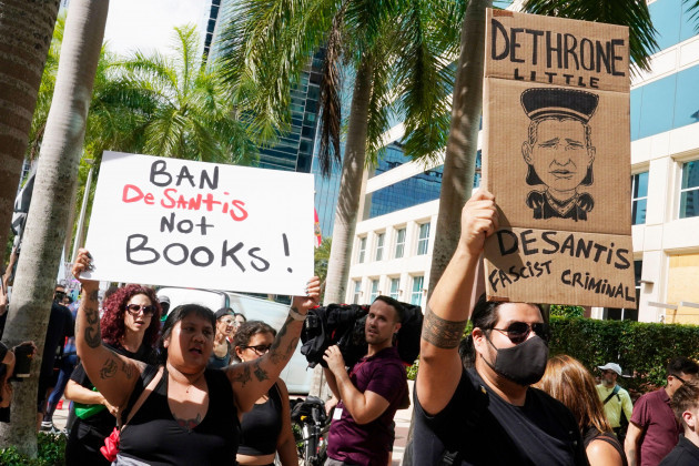 protestors-march-near-the-hotel-where-florida-gov-ron-desantis-donors-are-expected-to-meet-wednesday-may-24-2023-in-miami-the-44-year-old-republican-governor-is-an-outspoken-cultural-conservative