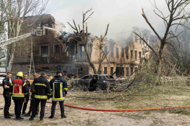 dnipro-illinois-ukraine-26th-may-2023-firefighters-and-rescue-workers-at-the-scene-of-a-russian-air-strike-on-a-clinic-in-dnipro-ukraine-the-russian-air-strike-hit-in-the-morning-and-killed-at