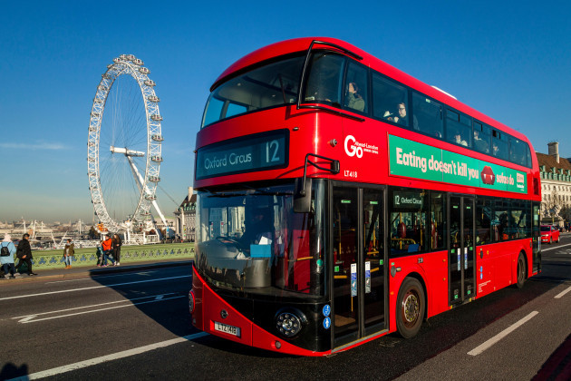 a-london-bus-crossing-westminster-bridge-with-the-london-eye-in-the-backround-london-england