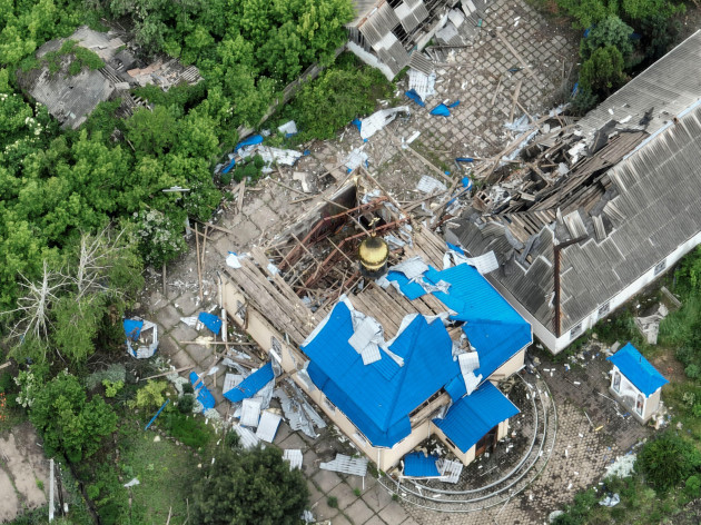 an-aerial-view-of-a-ruined-church-damaged-private-houses-in-the-suburbs-of-donetsk-the-site-of-fierce-battles-with-the-russian-forces-ukraine-friday-may-26-2023-ap-photoefrem-lukatsky