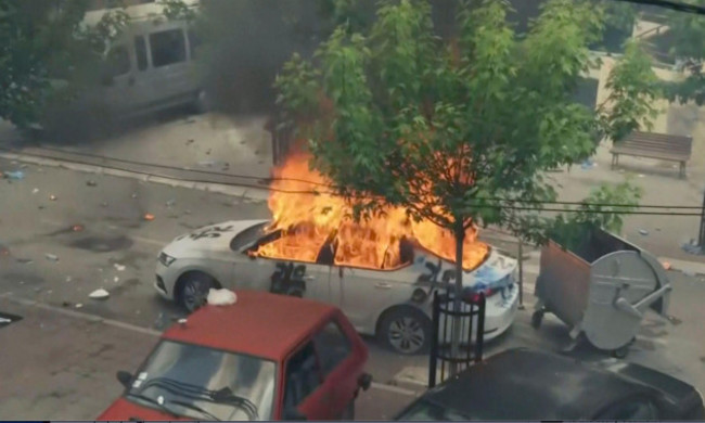 in-this-grab-taken-from-video-a-view-of-a-car-set-on-fire-as-kfor-soldiers-clash-with-kosovo-serbs-in-the-town-of-zvecan-northern-kosovo-monday-may-29-2023-ethnic-serbs-in-northern-kosovo-have-c