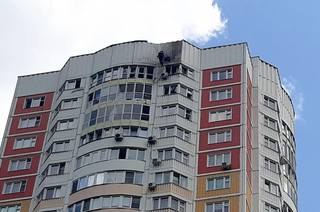 an-investigator-inspects-a-damage-after-a-ukrainian-drone-attacked-an-apartment-building-in-moscow-russia-tuesday-may-30-2023-in-moscow-residents-reported-hearing-explosions-and-mayor-sergei-sob