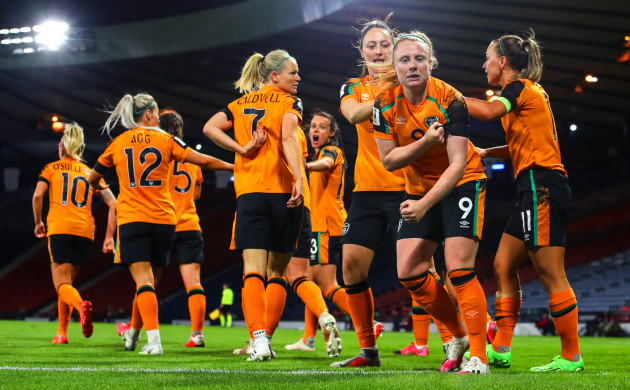 amber-barrett-celebrates-scoring-their-first-goal-with-teammates-as-she-gestures-to-the-black-armband-worn-in-memory-of-those-affected-by-the-tragedy-in-creeslough
