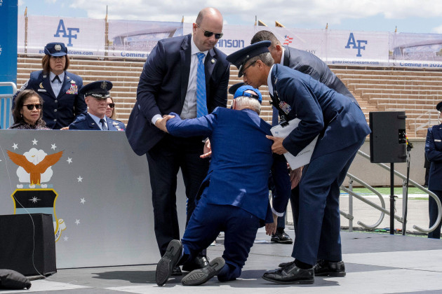 president-joe-biden-falls-on-stage-during-the-2023-united-states-air-force-academy-graduation-ceremony-at-falcon-stadium-thursday-june-1-2023-at-the-united-states-air-force-academy-in-colorado-spr
