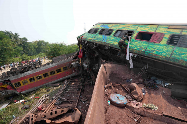 rescuers-work-at-the-site-of-passenger-trains-that-derailed-in-balasore-district-in-the-eastern-indian-state-of-orissa-saturday-june-3-2023-rescuers-are-wading-through-piles-of-debris-and-wreckag
