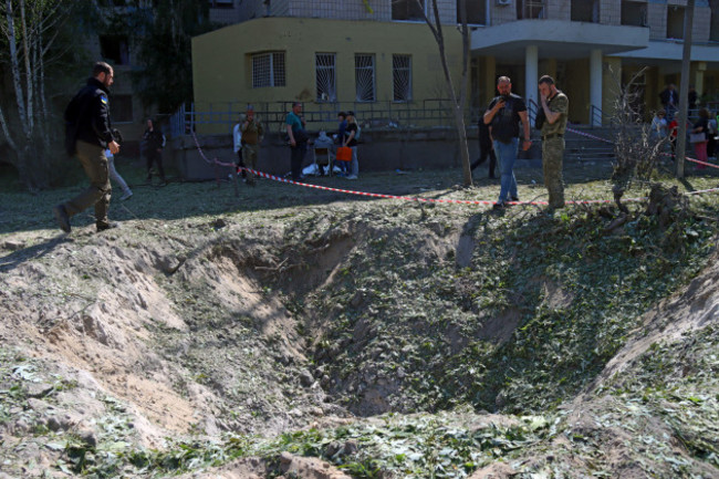 kyiv-ukraine-june-1-2023-the-crater-from-falling-russian-rocket-debris-is-seen-outside-a-polyclinic-in-the-desnianskyi-district-of-kyiv-capital-of-ukraine-a-nine-year-old-girl-her-mother-and