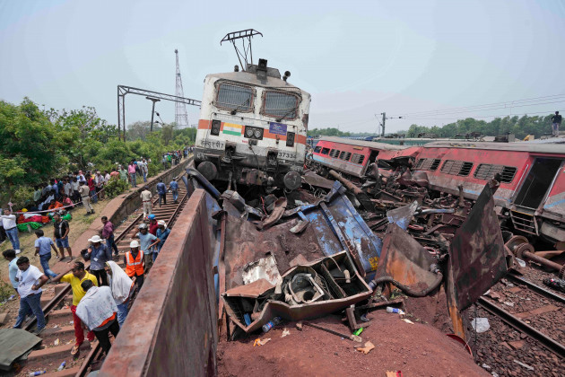 rescuers-work-at-the-site-of-passenger-trains-that-derailed-in-balasore-district-in-the-eastern-indian-state-of-orissa-saturday-june-3-2023-rescuers-are-wading-through-piles-of-debris-and-wreckag