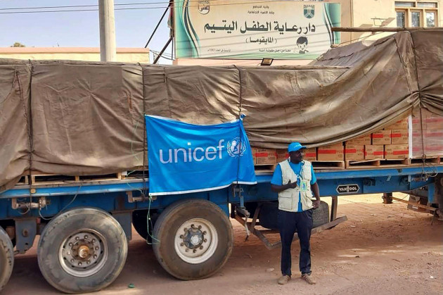 a-truck-carrying-humanitarian-assistance-from-the-un-childrens-agency-stands-in-front-of-the-foster-home-for-orphans-in-khartoum-sudan-may-2023-at-least-60-infants-toddlers-and-older-children-per