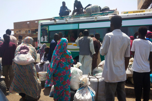people-board-a-bus-to-leave-khartoum-sudan-saturday-june-3-2023-as-fighting-between-the-sudanese-army-and-paramilitary-rapid-support-forces-intensified-ap-photo