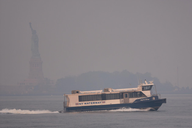 statue-of-liberty-viewed-from-pier-a-lower-manhattan-new-york-can-hardly-be-made-out-due-to-pollution-levels-air-pollution-levels-are-set-to-reach-above-200-aqi-record-levels-today-8th-of-june-20