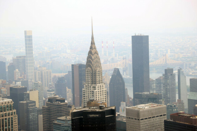 new-york-ny-8th-june-2023-aerial-view-of-the-ny-skyline-as-hazardous-air-quality-prompts-cancellation-of-school-activities-and-outdoor-restaurants-as-a-result-of-the-canada-wildfire-has-hit-parts