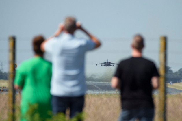 jagel-germany-12th-june-2023-onlookers-watch-the-takeoff-of-a-tornado-fighter-jet-at-the-start-of-the-international-air-force-maneuver-air-defender-2023-at-the-fence-of-the-schleswigjagel-air-b