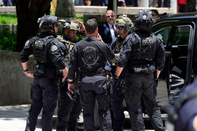 police-gather-after-the-motorcade-carrying-former-president-donald-trump-arrived-at-the-wilkie-d-ferguson-jr-u-s-courthouse-tuesday-june-13-2023-in-miami-trump-is-making-a-federal-court-appear