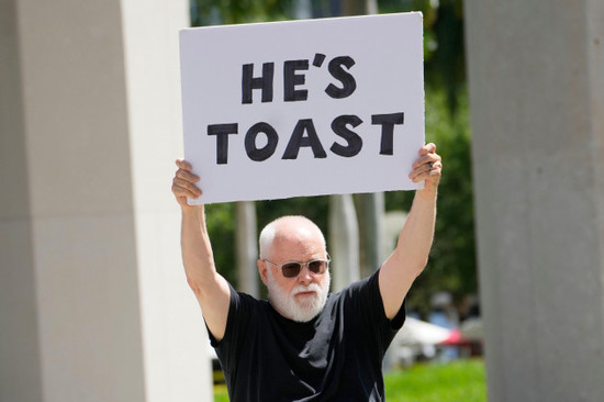 people-rally-outside-the-wilkie-d-ferguson-jr-u-s-courthouse-tuesday-june-13-2023-in-miami-former-president-donald-trump-is-making-a-federal-court-appearance-on-dozens-of-felony-charges-accusi