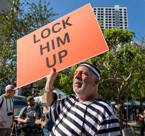 miami-florida-usa-13th-june-2023-domenic-santana-a-supporter-of-the-charges-against-former-us-president-donald-trump-dresses-in-costume-in-front-of-the-wilkie-d-ferguson-jr-us-federal-courtho