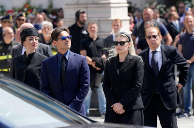 paolo-berlusconi-brother-of-former-italian-premier-silvio-berlusconi-right-and-silvio-berlusconis-children-barbara-second-from-right-pier-silvio-and-eleonora-left-wait-for-their-fathers-hear