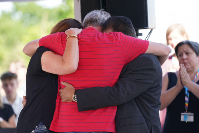 grace-omalley-kumars-father-right-and-barnaby-webbers-parents-embrace-during-a-vigil-at-the-university-of-nottingham-after-they-and-ian-coates-were-killed-and-another-three-hurt-in-connected-atta