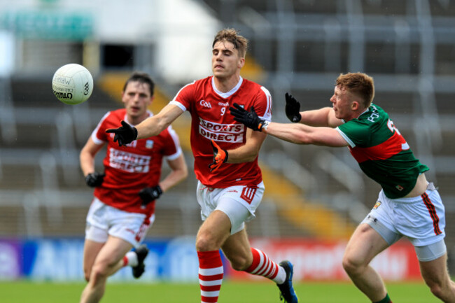 ian-maguire-gets-the-ball-away-under-pressure