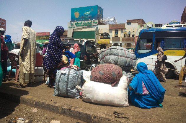 people-board-a-bus-to-leave-khartoum-sudan-saturday-june-3-2023-as-fighting-between-the-sudanese-army-and-paramilitary-rapid-support-forces-intensified-ap-photo