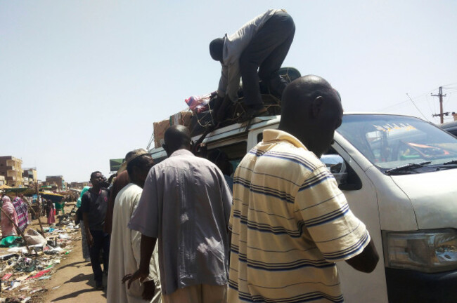 people-board-a-bus-to-leave-khartoum-sudan-saturday-june-3-2023-as-fighting-between-the-sudanese-army-and-paramilitary-rapid-support-forces-intensified-ap-photo