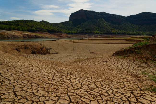 dry-solid-clods-are-seen-at-the-sau-water-reservoir-the-water-resevoir-one-of-the-main-sources-of-water-of-the-spanish-region-of-catalonia-and-in-particular-for-the-city-of-barcelona-is-now-at-6-ca