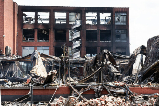 roubaix-france-1st-july-2023-a-building-set-on-fire-by-protesters-is-seen-in-roubaix-north-france-june-30-2023-violence-continued-in-france-overnight-from-thursday-to-friday-after-a-police-off