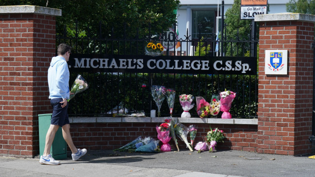 flowers-outside-st-michaels-college-in-dublin-ireland-after-the-deaths-of-two-recent-graduates-on-the-greek-island-of-ios-tributes-have-been-paid-to-the-two-teenagers-andrew-odonnell-and-max-wa