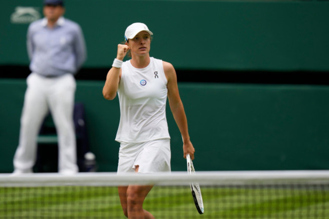 polands-iga-swiatek-celebrates-defeating-spains-sara-sorribes-tormo-during-the-womens-singles-match-on-day-three-of-the-wimbledon-tennis-championships-in-london-wednesday-july-5-2023-ap-photo