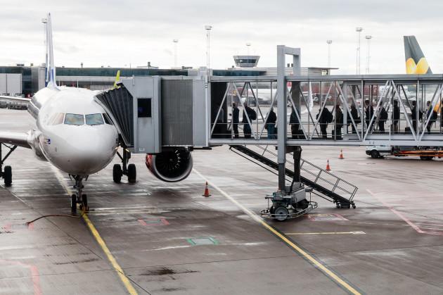 travellers-boarding-an-airbus-aircraft-along-an-airbridge-at-stockholm-arlanda-airport