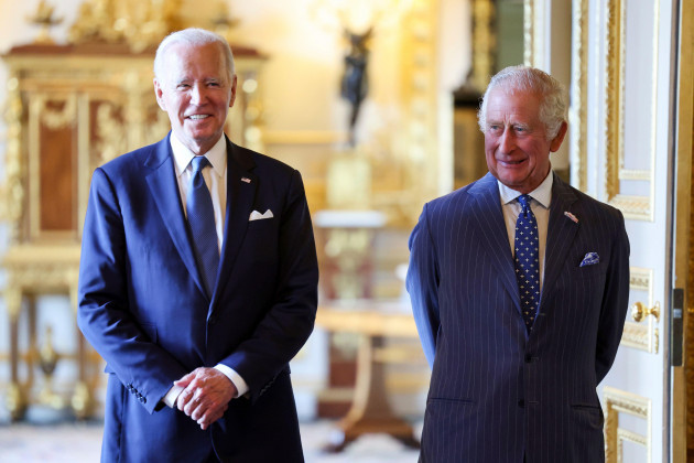 britains-king-charles-iii-right-and-u-s-president-joe-biden-stand-as-they-wait-in-the-green-drawing-room-to-meet-with-participants-of-the-climate-finance-mobilisation-forum-at-windsor-castle-engl