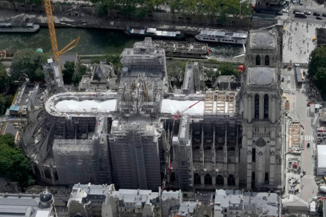 notre-dame-de-paris-cathedral-is-pictured-after-a-huge-oak-frame-was-set-up-tuesday-july-11-2023-in-paris-the-panels-are-due-to-be-reassembled-on-the-top-of-notre-dame-to-replace-the-roof-that-fla