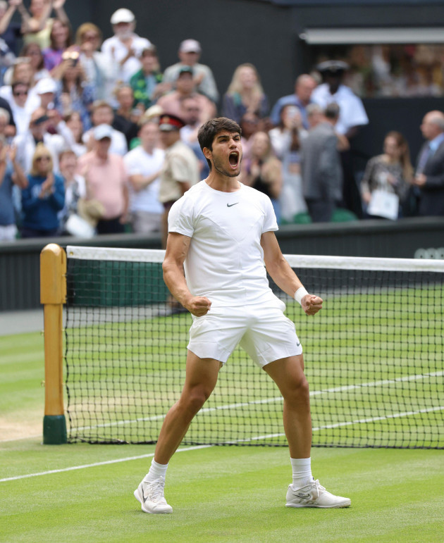 carlos-alcaraz-of-spain-celebrates-after-winning-the-gentlemens-singles-quarter-finals-match-against-holger-rune-of-denmark-in-the-championships-wimbledon-at-all-england-lawn-tennis-and-croquet-club