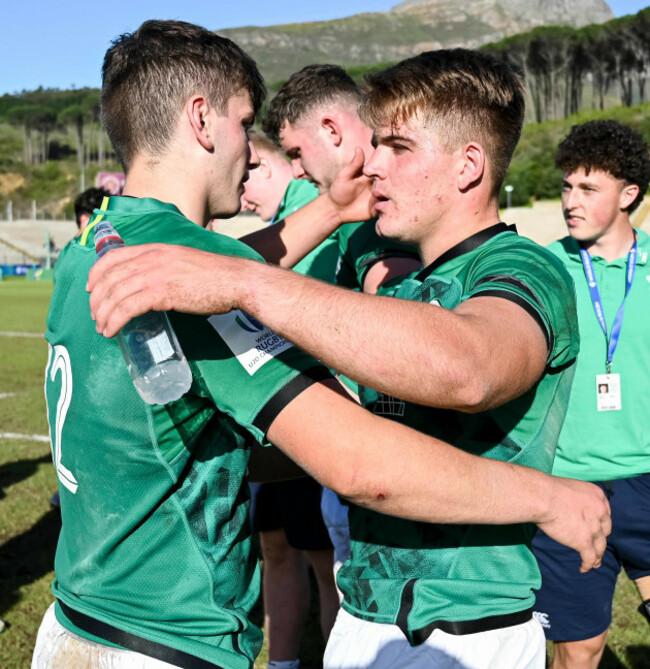 john-devine-and-sam-berman-share-a-hug-after-the-game