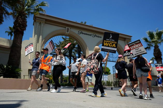 picketers-gather-outside-paramount-pictures-during-a-writers-guild-rally-on-thursday-july-13-2023-in-los-angeles-the-rally-follows-a-press-conference-announcing-a-strike-by-the-screen-actors-guild