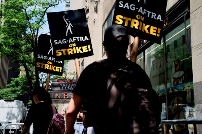 writers-and-actors-join-forces-as-they-walk-the-picket-line-during-a-strike-friday-july-14-2023-at-nbc-universal-studios-in-new-york-city-some-of-the-nations-top-movie-stars-could-be-on-the-pick