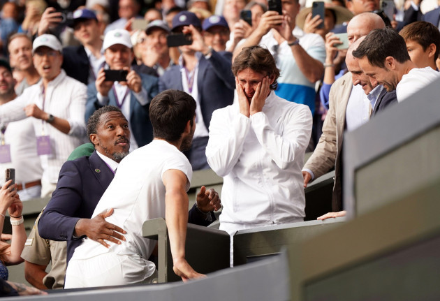 carlos-alcaraz-celebrates-victory-with-his-coach-juan-carlos-ferrero-following-the-gentlemens-singles-final-on-day-fourteen-of-the-2023-wimbledon-championships-at-the-all-england-lawn-tennis-and-croq