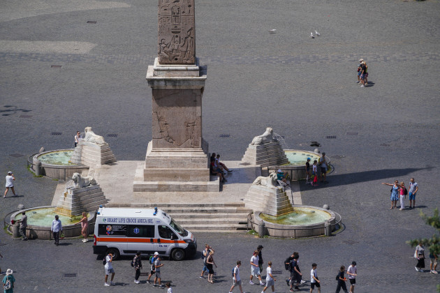 rome-italy-16-july-2023-an-ambulance-in-piazza-del-popolo-to-treat-people-with-heat-exhaustion-on-another-sweltering-day-with-high-temperatures-in-rome-the-italian-health-ministry-has-issued-a-r