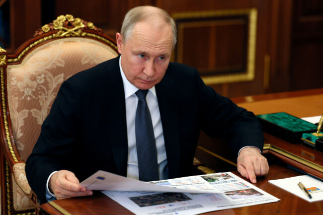 russian-president-vladimir-putin-listens-to-saratov-region-governor-roman-busargin-during-their-meeting-at-the-kremlin-in-moscow-russia-tuesday-july-18-2023-alexander-kazakov-sputnik-kremlin-p