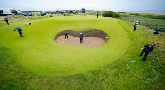 denmarks-rasmus-hojgaard-plays-out-of-a-bunker-on-the-17th-green-during-a-practice-round-for-the-british-open-golf-championships-at-the-royal-liverpool-golf-club-in-hoylake-england-tuesday-july-18