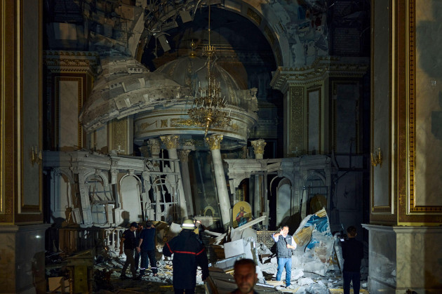 people-walk-inside-the-odesa-transfiguration-cathedral-heavily-damaged-in-a-russian-missile-attack-in-odesa-ukraine-sunday-july-23-2023-ap-photolibkos