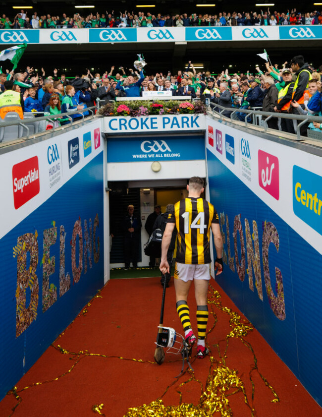 tj-reid-leaves-the-field-dejected-as-limerick-manager-john-kiely-celebrates-with-the-liam-maccarthy-cup