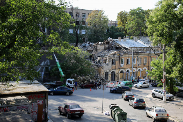 july-24-2023-odessa-ukraine-a-worker-cleans-up-the-destruction-caused-by-a-rocket-attack-at-military-descent-the-day-after-the-rocket-attack-in-odessa-according-to-the-operational-command-sout