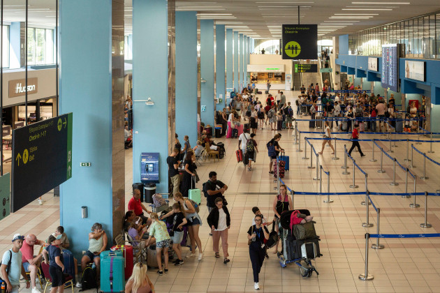 paradeisi-greece-24th-july-2023-tourists-wait-for-their-flight-at-diagoras-international-airport-among-those-affected-by-forest-fires-in-greece-are-many-vacationers-from-germany-credit-socrates