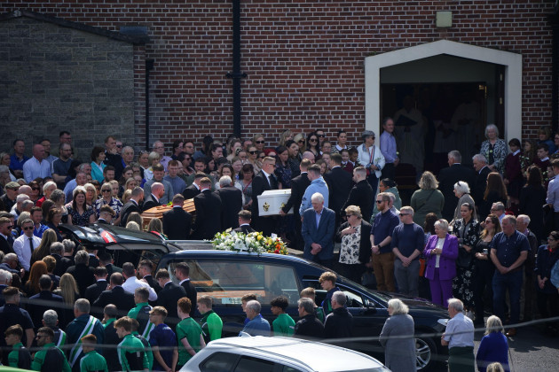 the-coffins-of-father-and-son-eoin-and-dylan-fitzpatrick-are-carried-into-their-funeral-service-at-st-peter-and-pauls-church-in-portlaoise-co-laois-eoin-and-dylan-died-in-a-road-crash-while-on-holi