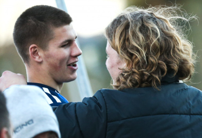 sam-prendergast-is-congratulated-by-his-brother-cian-after-the-game