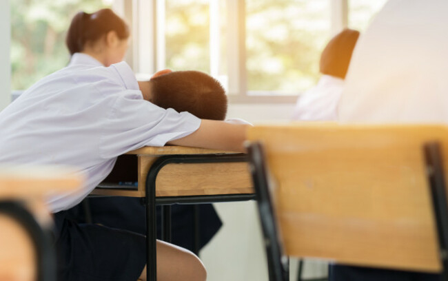 behindasianboysstudentsinuniformsleepinginexaminationin