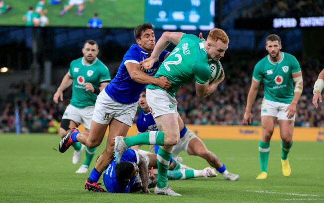 ciaran-frawley-is-tackled-by-alessandro-fusco